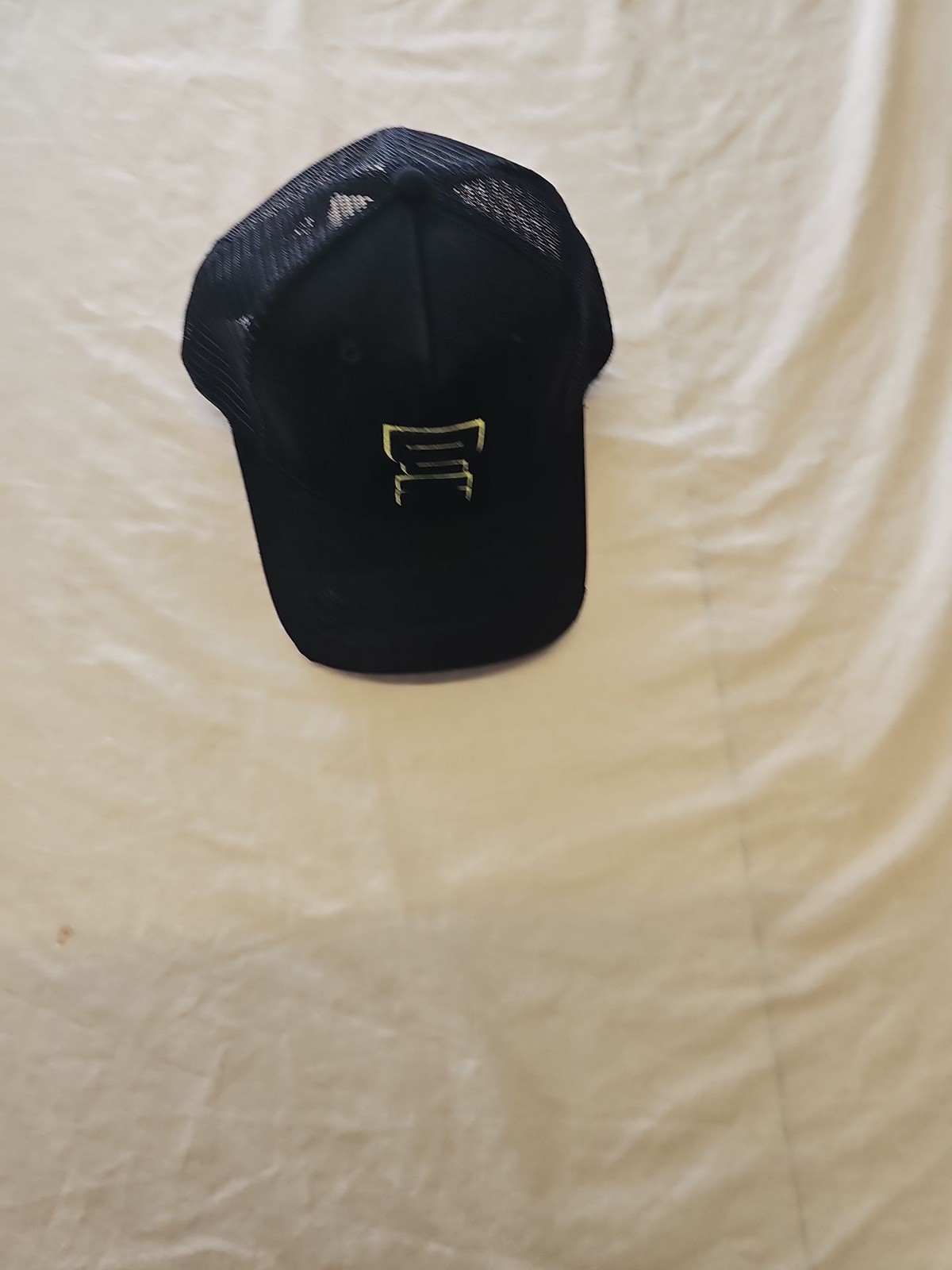 DJK International Black Mesh Trucker Cap