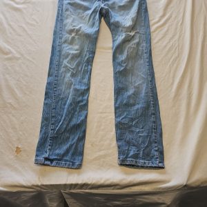 Vintage Levi's 514 Straight Fit Distressed Light Wash Jeans w31 L32 J656