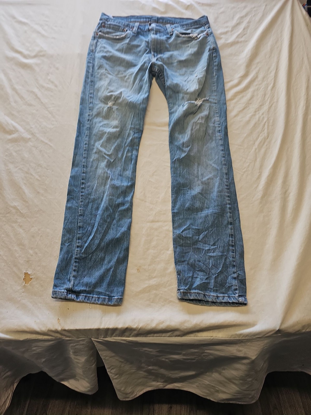 Vintage Levi's 514 Straight Fit Distressed Light Wash Jeans w31 L32 J656